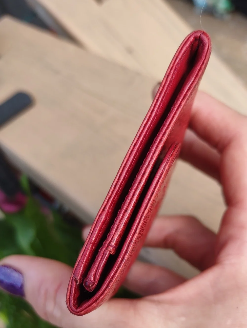 CHANEL Red Quilted CC Embossed Leather Coin Wallet.